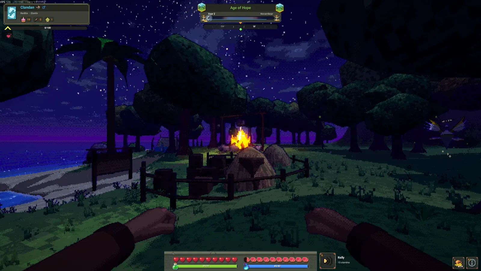 The same camp at night under the stars, the fire lighting the huts.