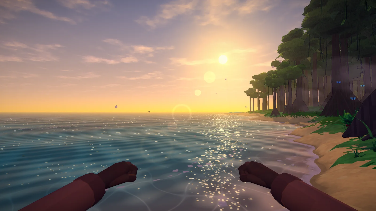 Looking out from a beach at golden hour: the low sun over a calm sea, a glittering road of light running in over the clear shallows, and a jungle shore curving away on the right.
