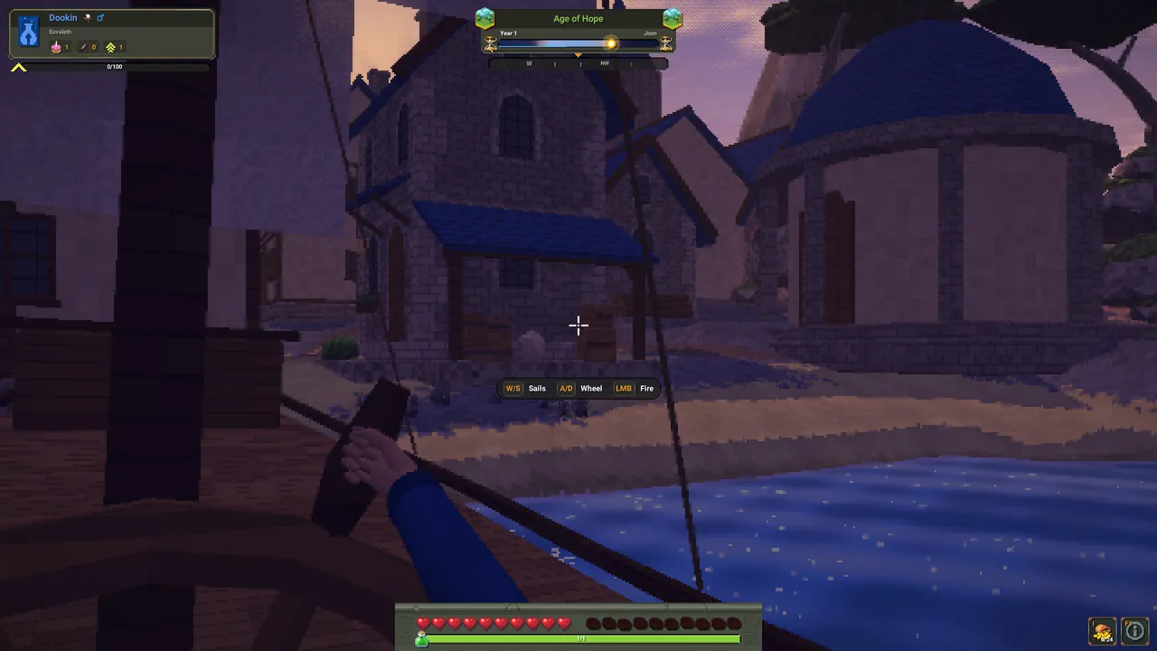 At a ship's wheel off the coast at dusk, the town's stone houses on the shore.